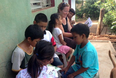 Annissa Walsh reading with the children